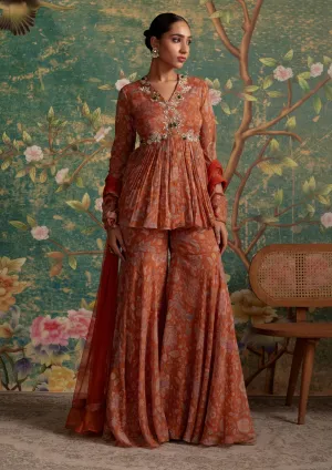 Awespiring orange peplum and gharara set