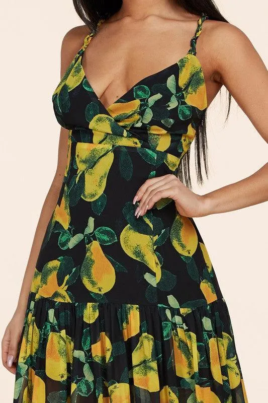 Black maxi dress boasts yellow pear print