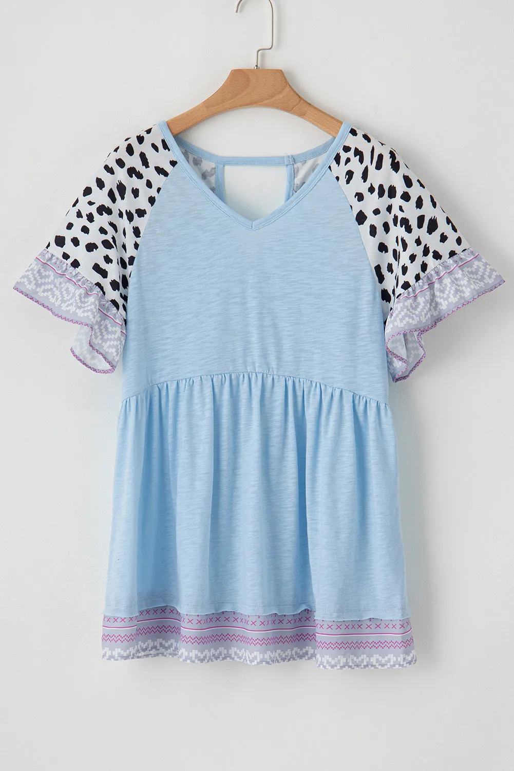 Iceland Blue Leopard Ruffled Patchwork Sleeve V Neck Blouse
