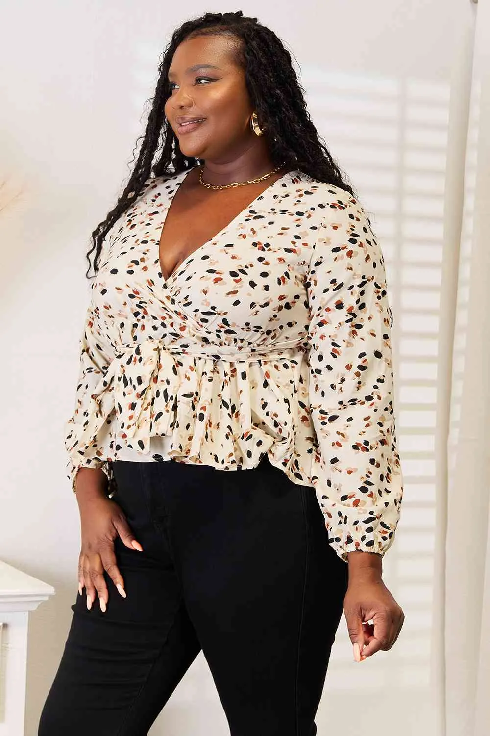 Jonah Printed Tied Plunge Peplum Blouse