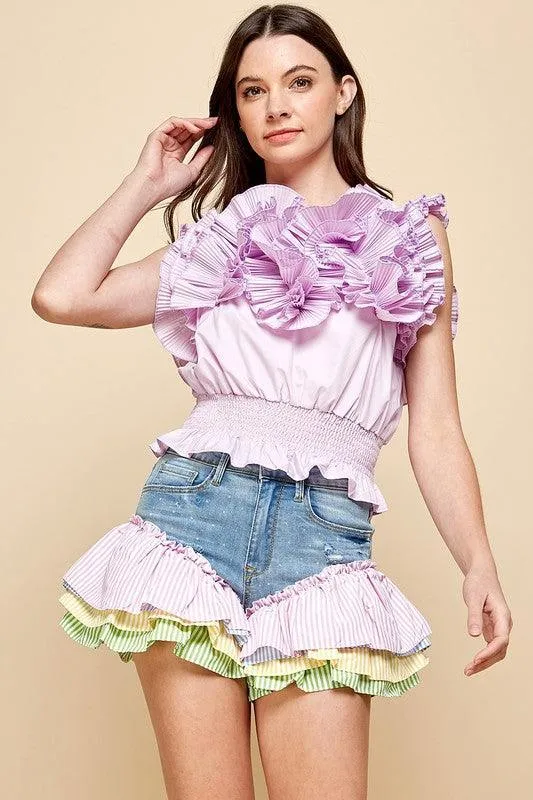 Layered ruffled crop top with ruched around torso.