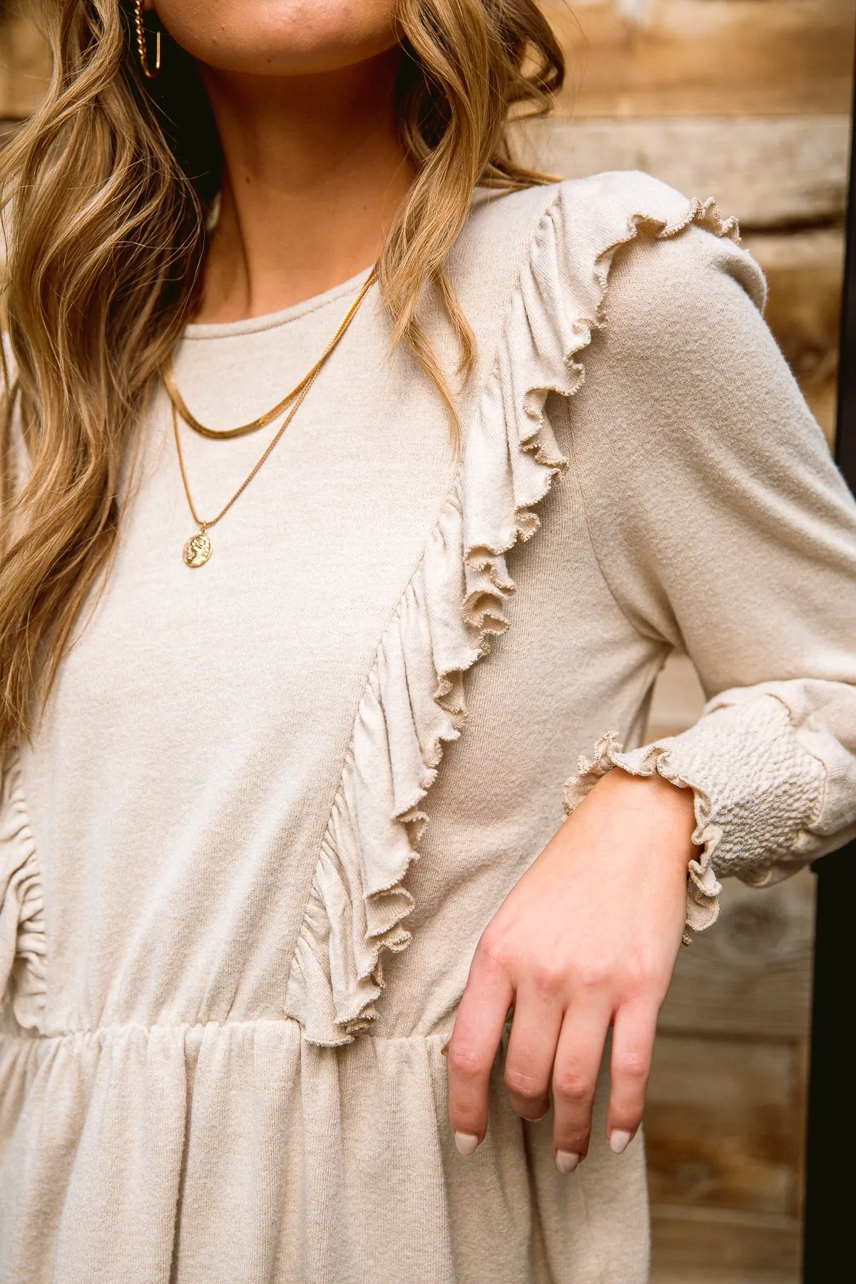 Melodia Peplum Top - Seashell, Long Sleeve with Ruffle Detail, Stretchy Fabric