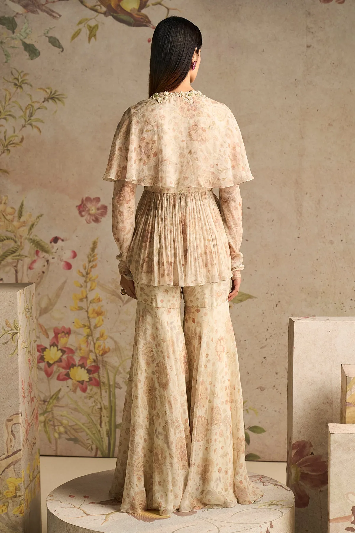 Pomp ivory peplum top and gharara