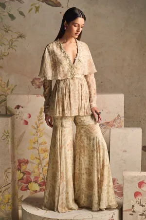 Pomp ivory peplum top and gharara