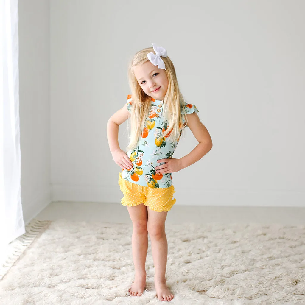 Posh Peanut Mirabella Henley Ruffled Capsleeve Top & Ruffled Varsity Short