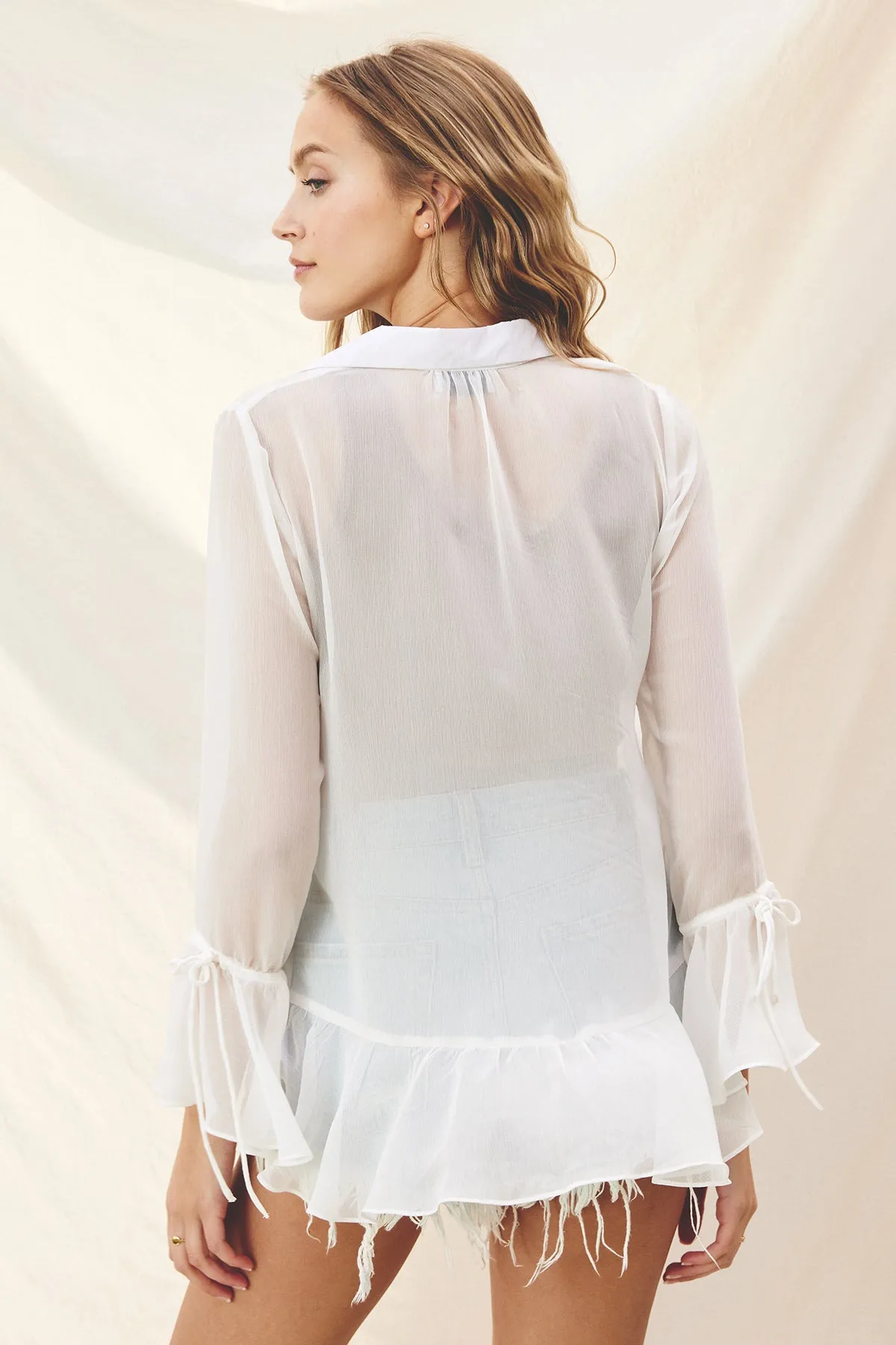 Semi Sheer Ruffled Tie Front Blouse