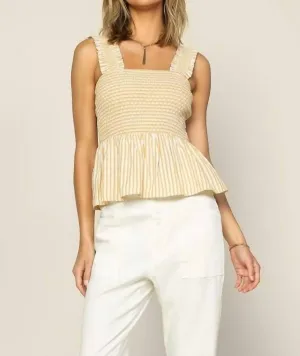 Striped Smocked Peplum Top In Yellow