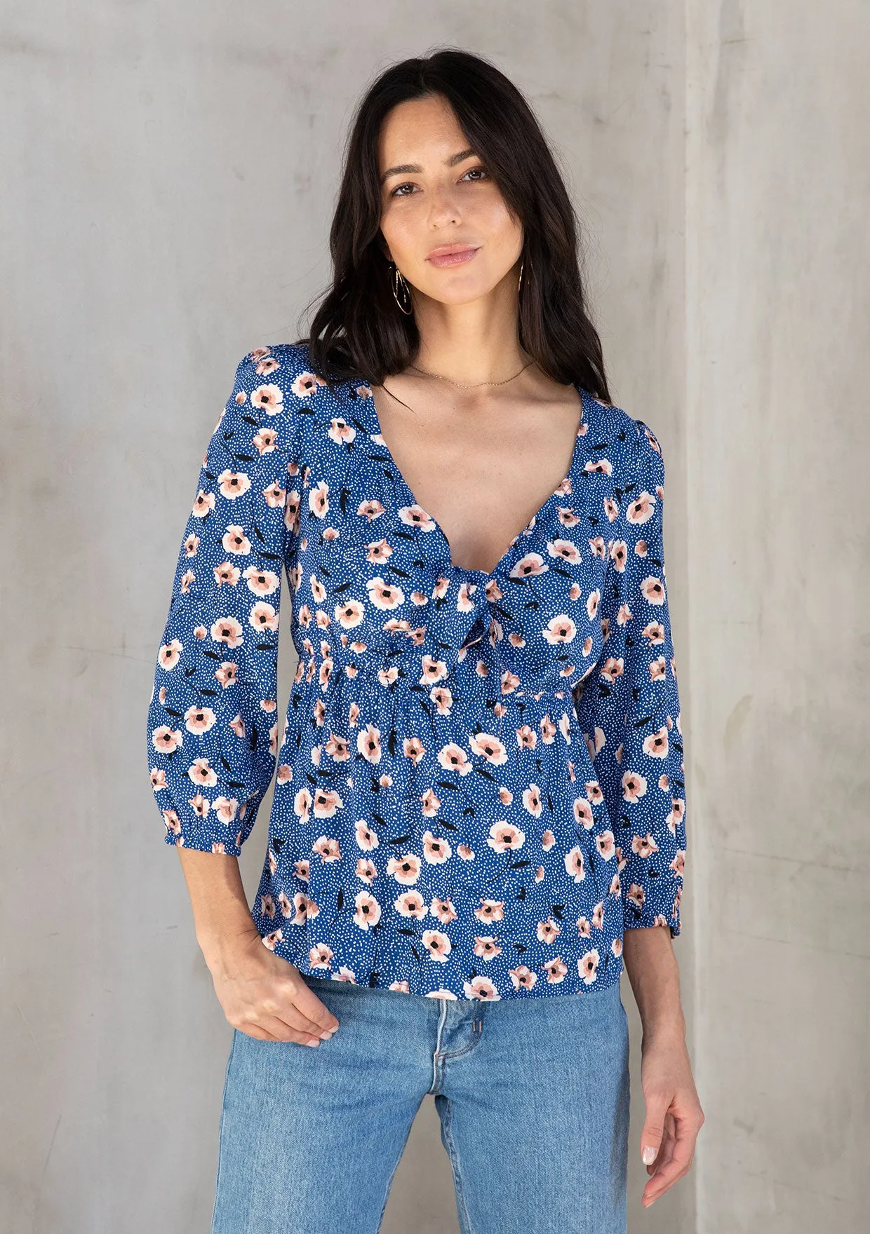 Vibrant Floral Print Tie Front Peplum Blouse