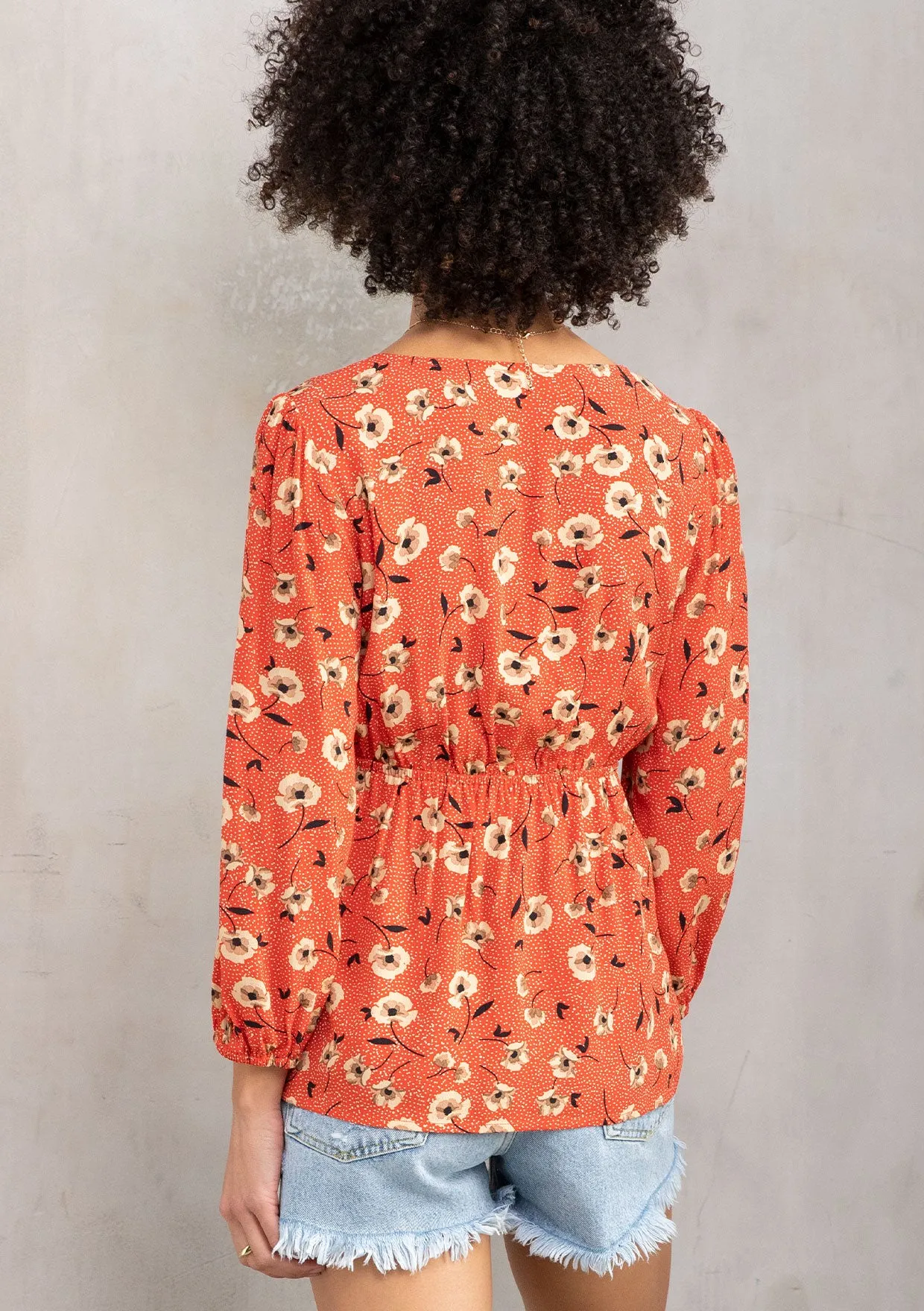 Vibrant Floral Print Tie Front Peplum Blouse