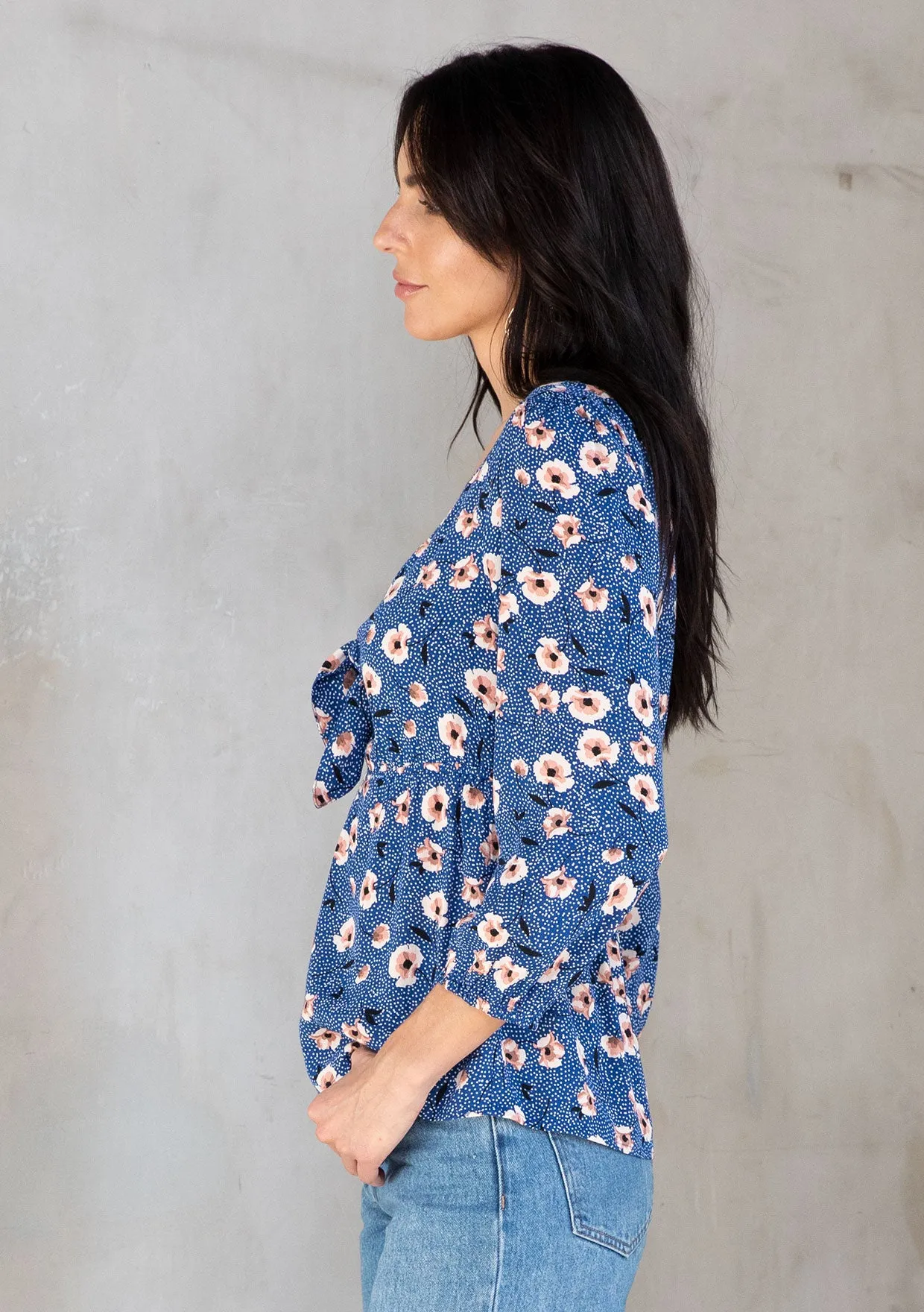 Vibrant Floral Print Tie Front Peplum Blouse